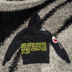 Men’s Champion Black Hoodie with Vibrant Yellow Text